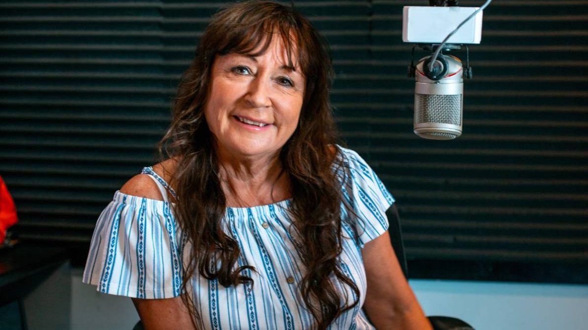 Brenda Devine in the Rock 95 studio