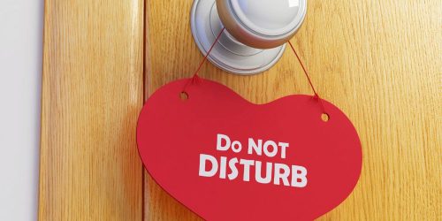 do not disturb sign on door