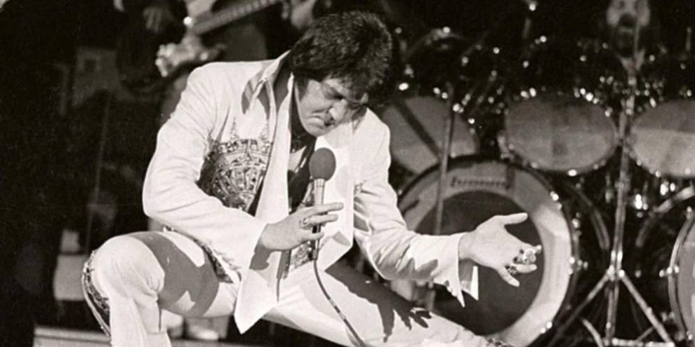 elvis presley on stage performing