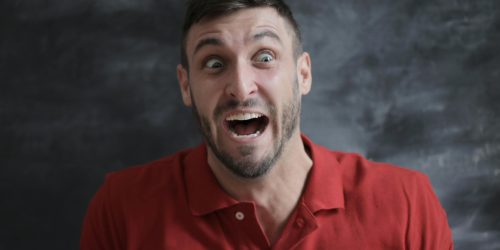 Surprised pexels-olly-by Andrea Piacquadio